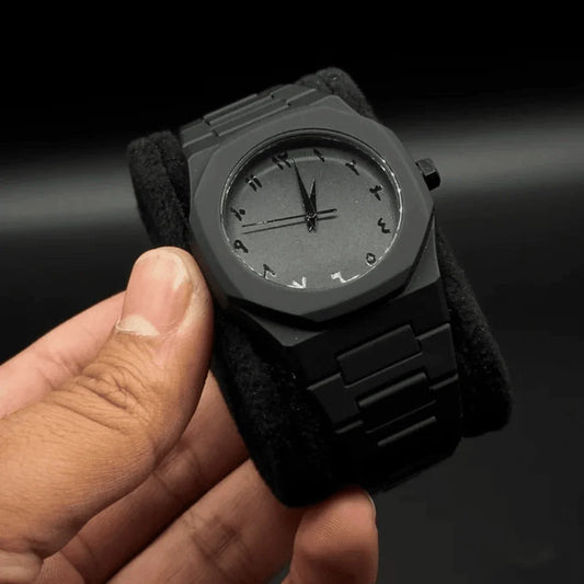 Black octagonal watch with matte finish, held in hand - Arabic Aura Watch UAE